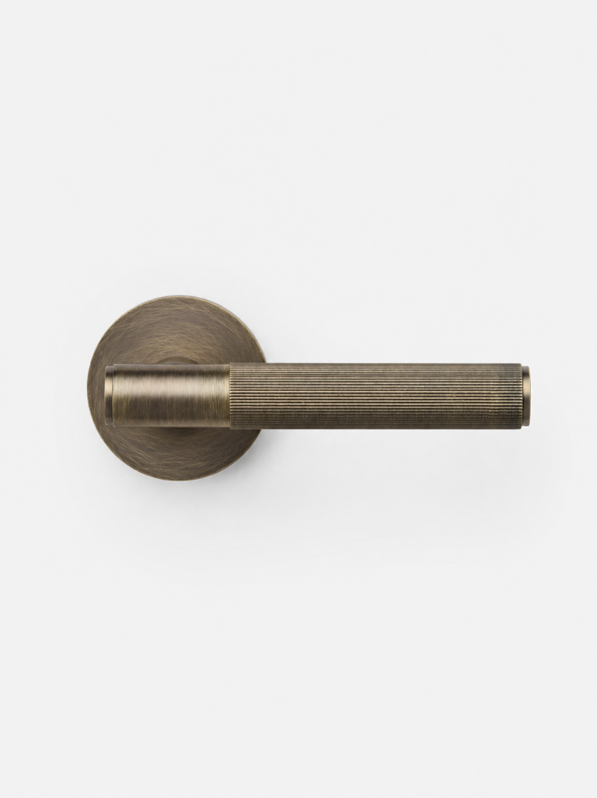 Manhattan dørhåndtak i Antique Brass