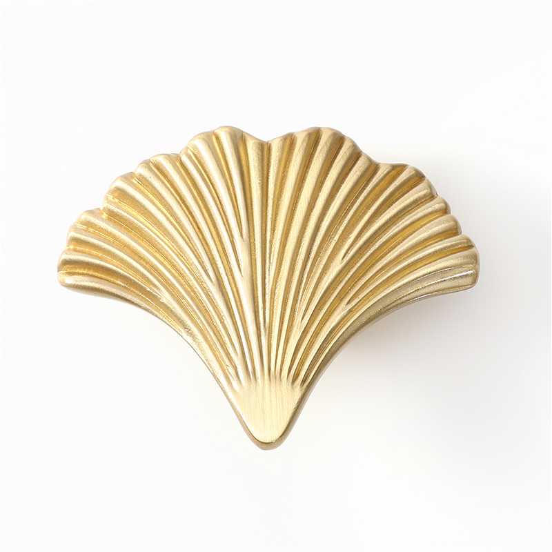 Skjell knott i børstet messing